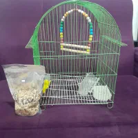 یک عدد قفس نو با لوازم ،جای دانه واب