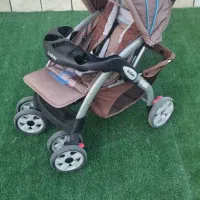 کالسکه و کریر good babyهمراه با آغوش بند