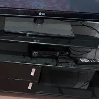 میز تلویزیون شیشه ای