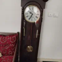 ساعت دیواری چوبی و بوفه