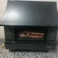 بخاری طرح شومینه ۱۸ هزار نیک کالا در حد نو|بخاری، هیتر، شومینه|صومعه‌سرا, |دیوار