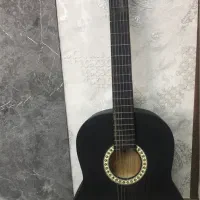 فروش گیتار کوک شده همراه ۲کتاب آموزشی