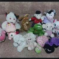 لاک پشت. خرس .گربه .عروسک. اسباب بازی