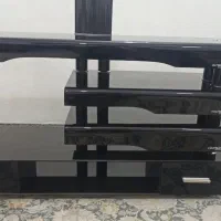 زیر تلویزیونی شیشه‌ای