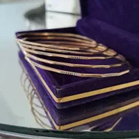 طلای بدون اجرت 50 زیر تابلو و100 بالای تابلو  دلار