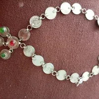 کلکسیون گردنبندسکه های 2 ریالی و1ریالی