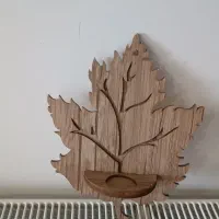 دیوار کوب چوبی طرح برگ