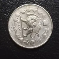 دو هزار دیناری عنوان با چرخش ۹۰ درجه فوق کمیاب