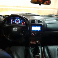 مزدا ۳۲۳fl تیپ ۲ رنگ نقره ای متالیک