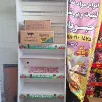 یه قفسه یه استندجای حبوبات وجای ادویه جات