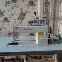 یک عدد چرخ خیاطی از برند سن استار