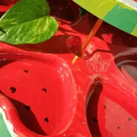 شیرینی‌خوری دو طبقه قلب انار مناسب یلدا