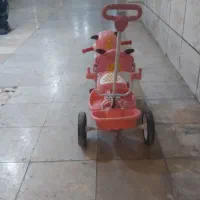دو عدد سه چرخه یکی صورتی یکی قرمز موزیکال|دوچرخه، اسکیت، اسکوتر|کرج, شهرک آسمان|دیوار
