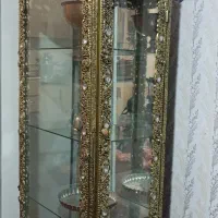 بوفه برنجی داخلش اینه