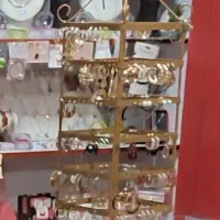 فروش استند گوشواره چرخشی به همراه گوشواره