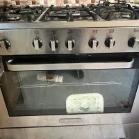 اجاق گازفردار ۵شعله دوو- یک دستگاه بخاری گازی