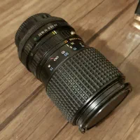 لنز کنون منوآل