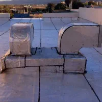 ایزوگام کاری و شیب بندی پشت بام