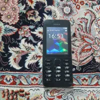 اتو و گوشی نوکیا