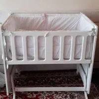 گهواره کنار مادر درحدنوع