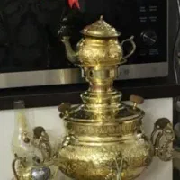 سماور برنجی کنده کاری شده ۶ لیتری ذغالی