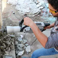 تخریب وکنده کاری انواع بتن ودیوار وتغیردرساختمان