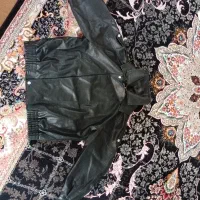 یک عدد کاپشن چرم خلبانی