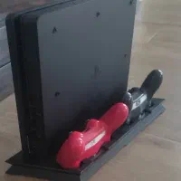 فروش ps4 یک ترا درحد نو با دسته و فن خنک کننده