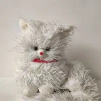 عروسک سگ سفید