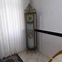 آینه کنسول وساعت ایستاده برنز