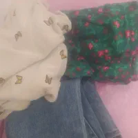 تعدادی لباس دخترونه و عروسک