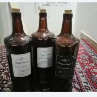 بطری شیشه‌ای و گالن مخصوص سرکه