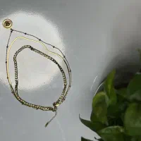 گردنبند و دستبند|بدلیجات|بندر انزلی, دهکده ساحلی|دیوار