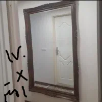 ایینه بزرگ دیواری با قاب چوبی