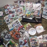 دستگاه دیویدی همراه ۵۰و۶۰فیلم