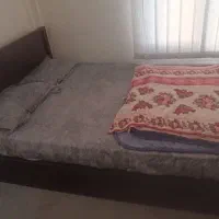 تخت دونفره به همراه تشک در حدنو - 1.55*2 متر