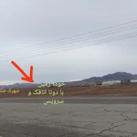 زمین مابین شهرک صنعتی خرمدشت و جاده اصلی
