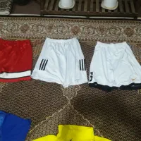 لباس و دستکش بوکس.