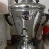 سماور  و تلویزیون ۲۱ اینچ و فرش دستباف و بوفه