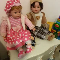عروسک موزیکال دو تا