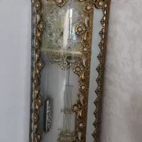 ساعت برنزی ایستاده