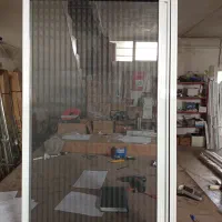 توری و پشه بند کشویی