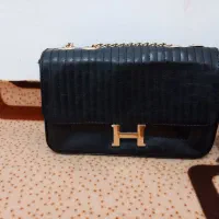 کیف|کیف، کفش، کمربند|میانه, |دیوار