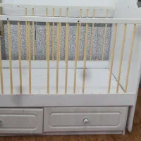 تخت کودک محرک لای لای کشودار