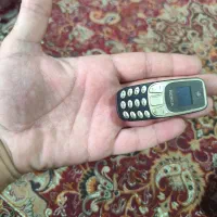 گوشی موبایل مینی (بند انگشتی ،)
