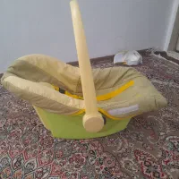 ی  کالسکه  و نی نی لای لای ب قیمت ۱۴۰۰ می‌