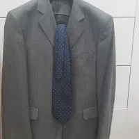 کت مجلسی به همراه جلیقه اش