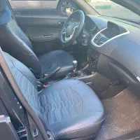 ۲۰۷ مشکی بیرنگ  فرمان برقی