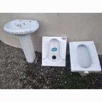 روشویی .کاسه .دبه آب .اجاق گاز .