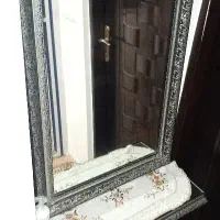 ساعت و آینه